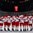 BUFFALO, NEW YORK - JANUARY 4: Team Denmark watches the Danish flag being raised during the national anthem following the team's victory over Belarus during the relegation round of the 2018 IIHF World Junior Championship. (Photo by Andrea Cardin/HHOF-IIHF Images)

